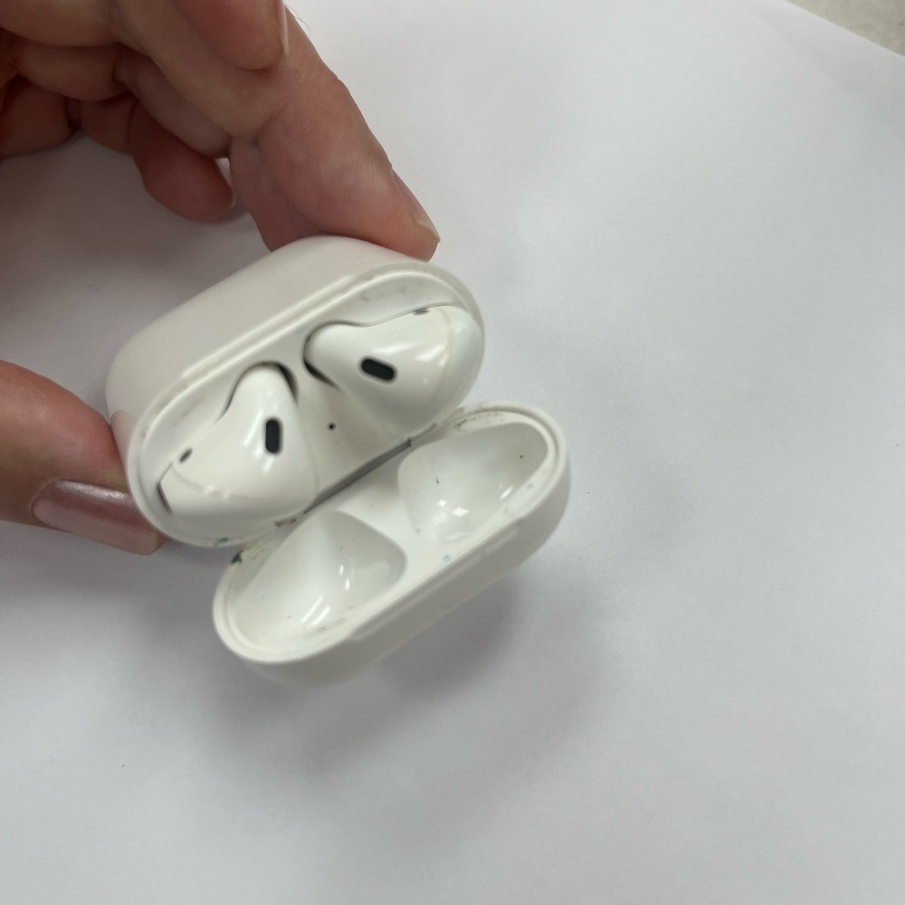 Used. Apple Wireless Earbuds with Charging Case